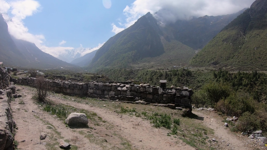 A basecamp at the foot of mountains in the scenic rural area of Langtang Valley, Nepal.