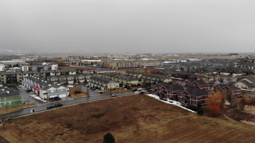 Drone shot of mass produced homes in the suburbs.