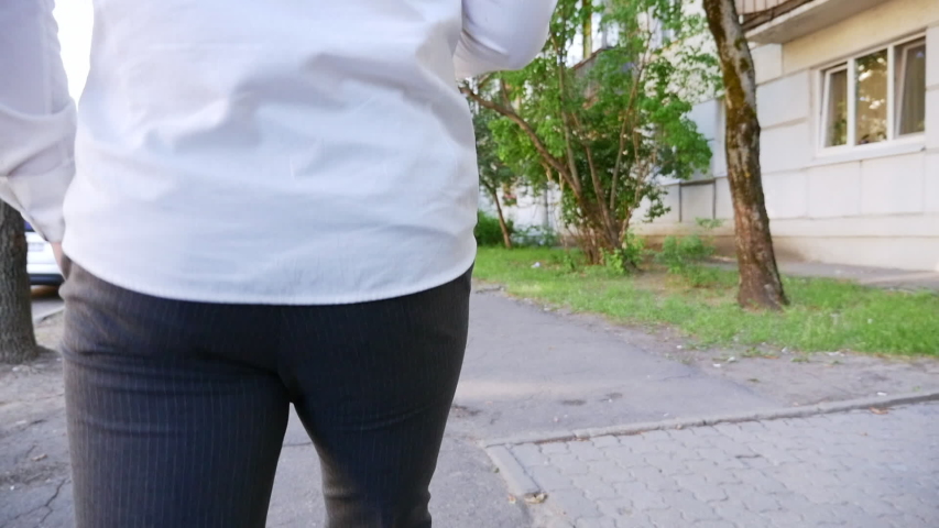 A man writes a texting SMS message using a smartphone.