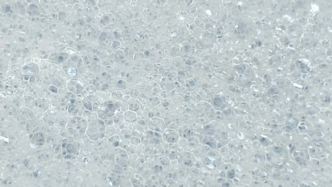 White Foam With Bubbles Popping の動画素材 ロイヤリティフリー Shutterstock