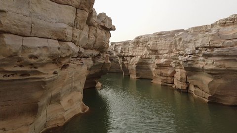 A desert canyon lake created by rainfall in Saudi Arabia 