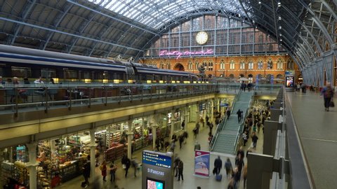 Busy travelers at St Pancras Train Station Time Lapse in London, UK - June 2019