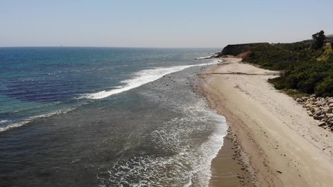 view of the California coastline, empty beach and calm ocean