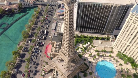 Drone flight over The Strip, Las vegas, Nevada. Jul 2019. 4k. View on Eiffel Tower, famouse hotels and traffic. Sunny day at famouse movies locations. Sleepy city after crazy night.