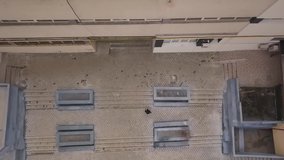 Drone shot of a man running through a building in Cluj Romania. Birds Eye View - Powered by Shutterstock - Get 15% off with code: PIKWIZARD15