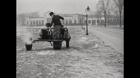 CIRCA 1930 - A three wheel vehicle is demonstrated in 1937.