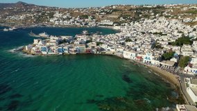 Aerial drone video of iconic whitewashed and colourful little Venice in main town of Mykonos island, Cyclades, Greece