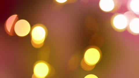 Rose Gold abstract blurred Christmas lights bokeh background in 4K