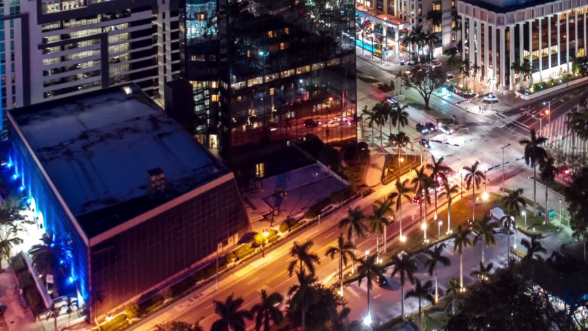 Aerial view of Miami city hyperlapse 4k drone panorama view flight over Miami at night. 