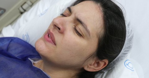 woman having contractions at hospital labor