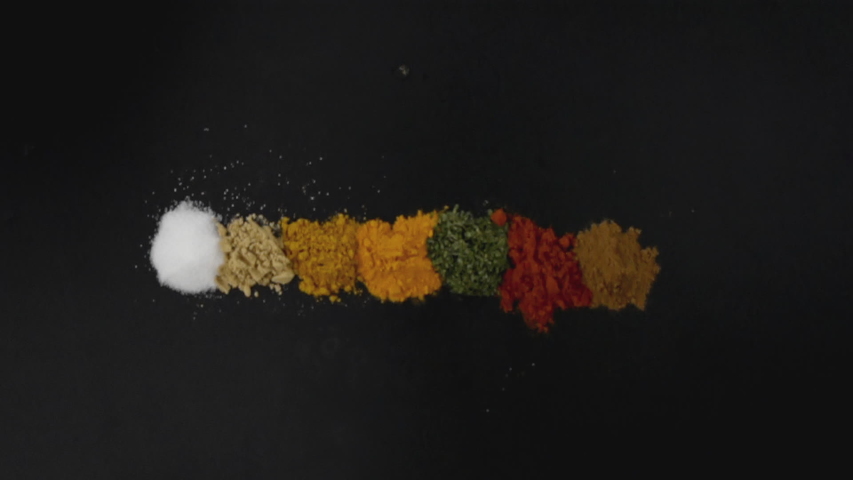 Exotic Spices  Flying up and Falling down in Slow Motion Royalty-Free Stock Footage #1033018451