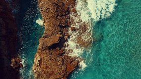 Aerial drone shot, Blue Lagoon island 4k travel video. Eye view on the sea coastline. Travel, Beach, islands, Nature, freedom concept. Beautiful panoramic birds eye view on ocean waves island.