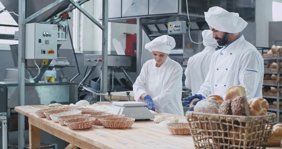 baking industry three professional bakers working Stock Footage Video (100%  Royalty-free) 1033022930 | Shutterstock