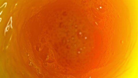 Super Slow Motion Shot of Orange Juice Vortex at 1000 fps.