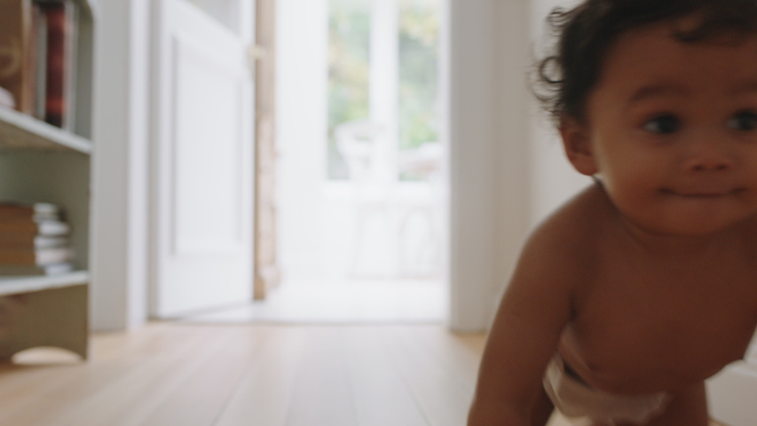 happy baby girl crawling on floor toddler exploring home curious infant having fun enjoying childhood Royalty-Free Stock Footage #1033025045