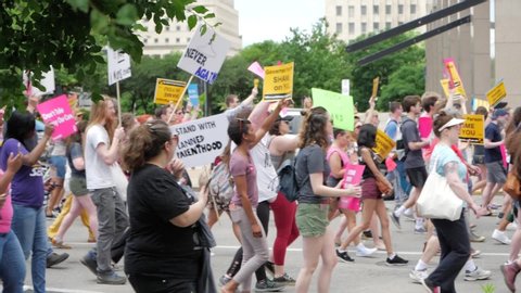 St. Louis, Missouri / United States - 05-30-2019: Pro Choice march and rally in downtown St. Louis right after conservative Governor Parsons rolled back women's healthcare, safety, and options.