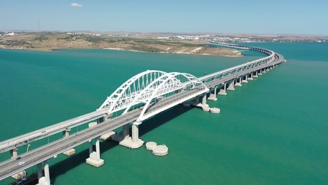 Crimea / Russia - July 3 2019: Crimean bridge across the Kerch Strait. Shooting from the air.