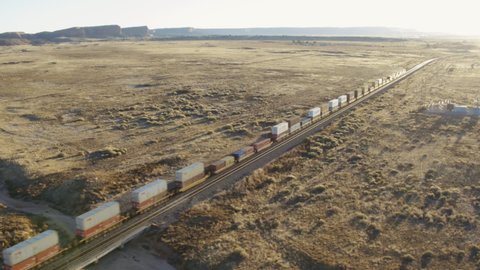Aerial view of freight train in desert, Gallup, New Mexico, United States