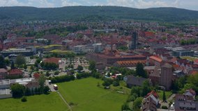 Aerial of the old part of town of Schorndorf in Germany. Wide view with slow descend.