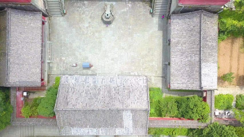 Top view of the main courtyard. Temple carved on rocks is located o the hillside (on palace facade written in chinese: Nanyan Palace). Nanyan Palace, Wudangshan Mountain, China