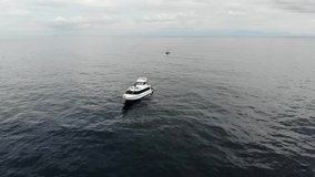 Yacht in the sea. video filming from the sky