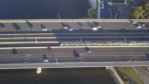 Top view of the traffic on a bridge in Perth. Aerial view of a bridge in a big Australian city
