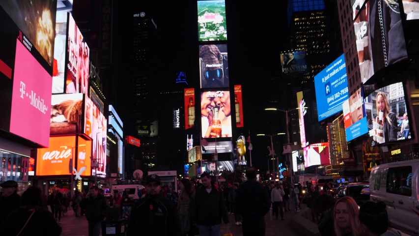 New York City, New York / United States - 12 12 2018: walking on time square in new york city during night