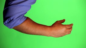 An arm in front of a green screen to be keyed and used at will. Rotate image for best results. Originally used for a few animated whiteboard videos. Full hand honking.