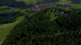 Aerial view around Strassdorf and Waldstetten. Round pan to the left with chapel and village in the back.