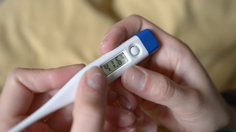 Electronic Thermometer Shows Temperature 38 3 Stock Footage Video 100 Royalty Free 1033183517 Shutterstock