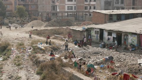 Kathmandu, Nepal - 12 04 2018: Slum scene near river in Kathmandu, Nepal.