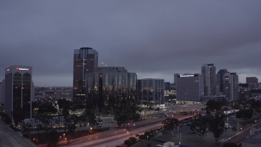 Long Beach, California glittering cityscape at night, AERIAL drone shot