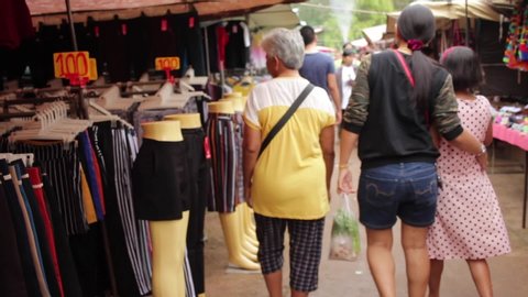 Banmai, Phitsanulok / Thailand - 12 30 2018: Tracking Shop Through Clothing Shop of Wat Bangsai Temple Market Phitsanulok Thailand