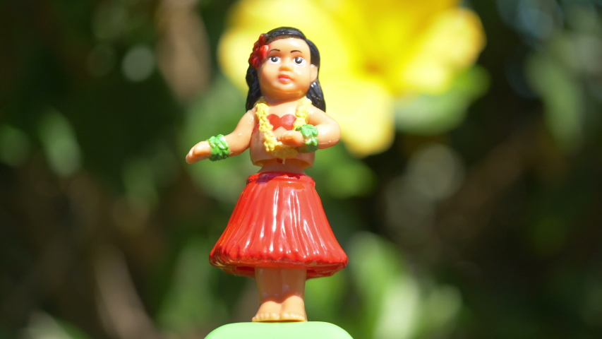 Traditional hula dancer souvenir toy in 4K slow motion 60fps