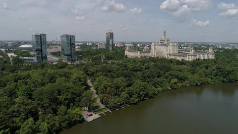 Aerial footage of the city of Bucharest at the House of Free Press and Herastrau Park