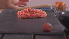 Shaping of home-made meatballs. Slow motion 