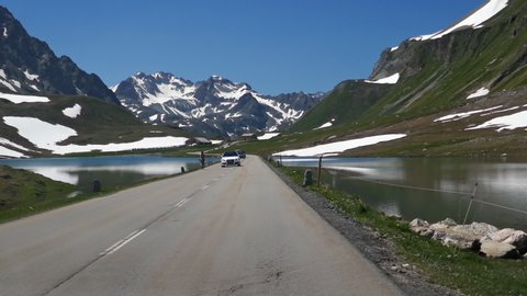 POV car travelling by road on Albula mountain pass, Graubunden, Switzerland.