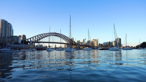 Harbour bridge in Sidney time lapse with boats passing