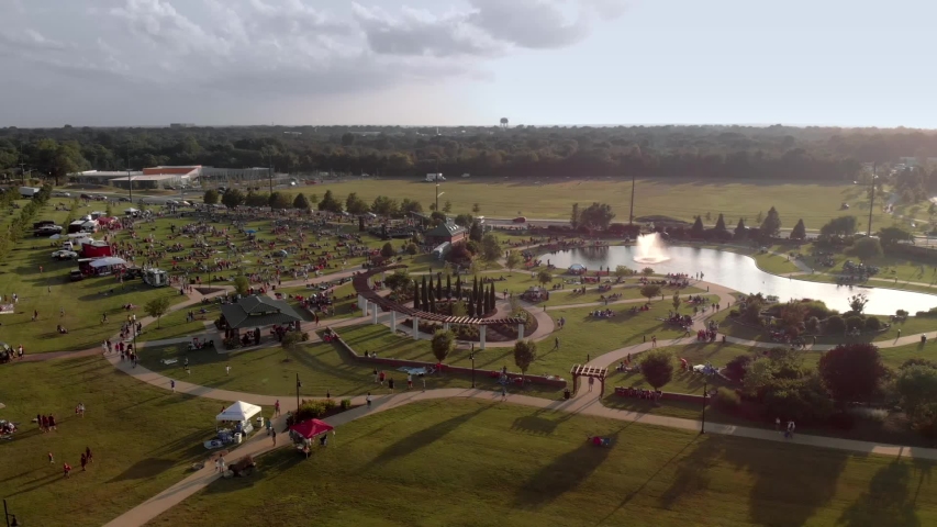 People gathering at a park for the local firework display