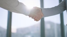 close up business people shaking hands successful corporate partnership deal welcoming opportunity for cooperation in office 4k footage - Powered by Shutterstock - Get 15% off with code: PIKWIZARD15