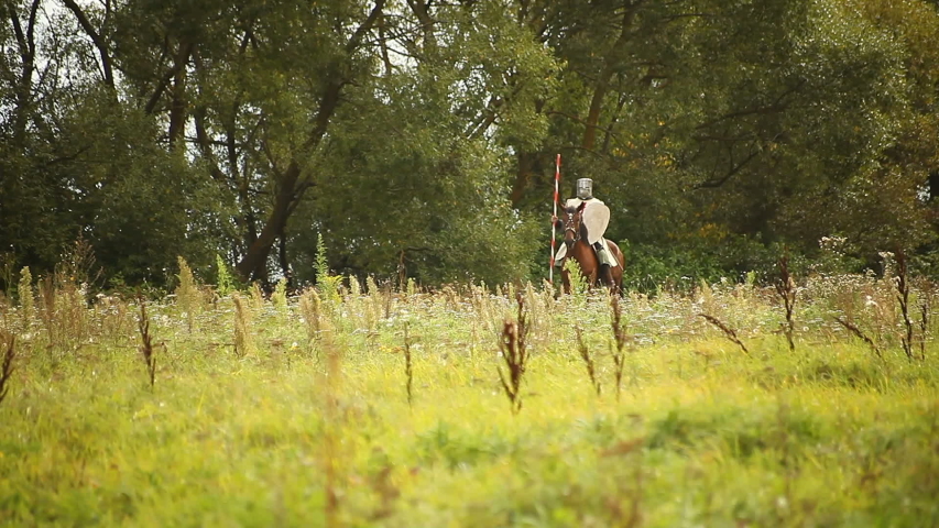 Medieval knights on horseback. original clothes.