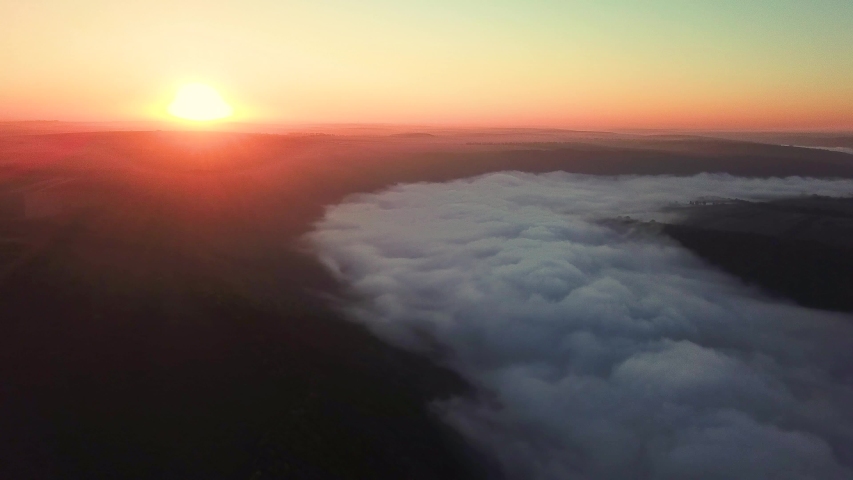 flight above the clouds above the river, Aerial view of Fog over the river at sunrise, thick fog over the river aerial, fog over the Dniester, river in the morning mist, Fog at sunrise