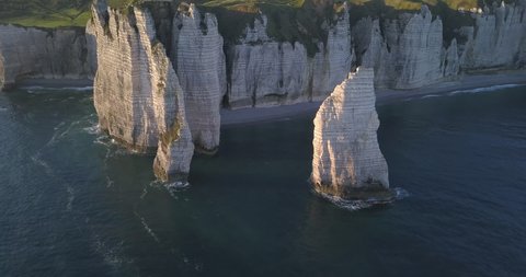 Aerial footage of the beautiful French coastline along the village of Étretat.