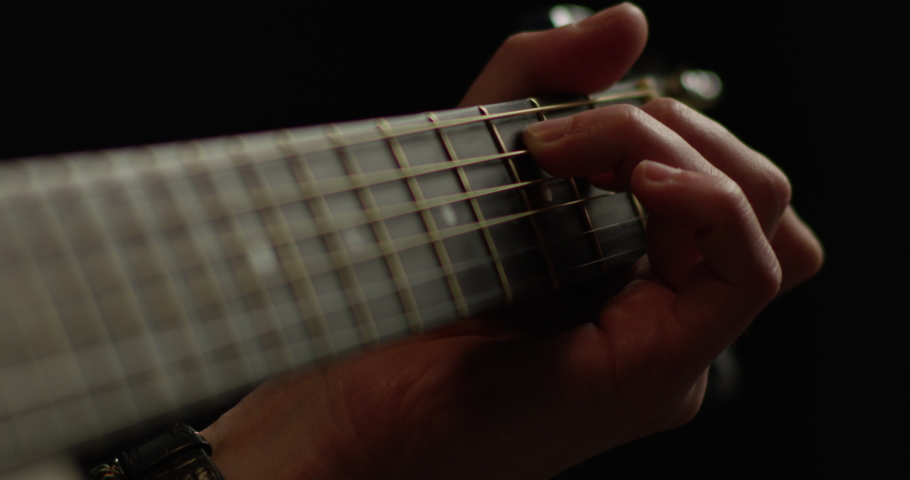 Acoustic guitar neck close up Royalty-Free Stock Footage #1033282520
