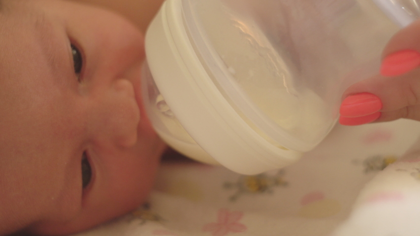 Mother Feeds Little Caucasian Girls Stock Footage Video (100% Royalty ...