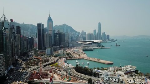 Aerial: Hong Kong Skyline, Motorway, Waterfront and Harbor