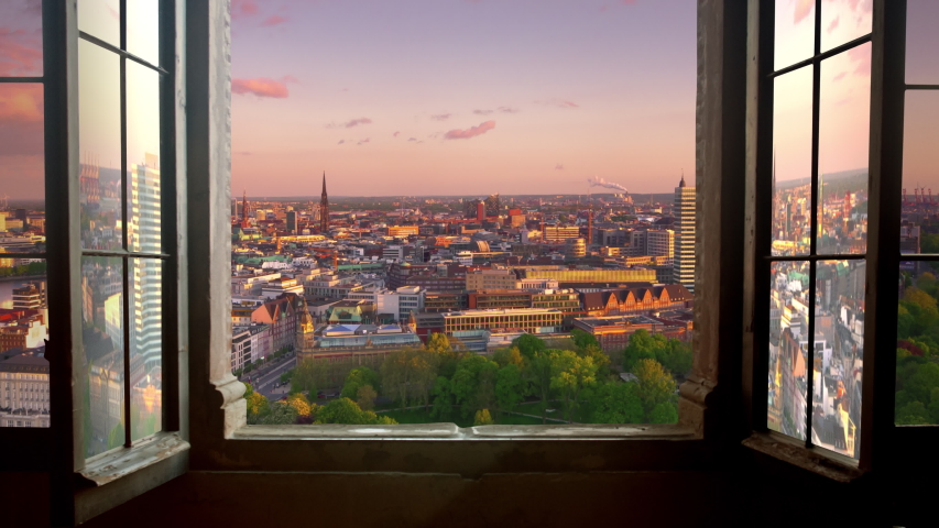 hamburg skyline timelapse day to night aerial view camera moving out from window
