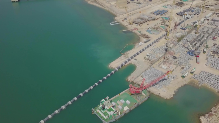 Saudi desalination plants and vessel with large crane (4K) Royalty-Free Stock Footage #1033316552