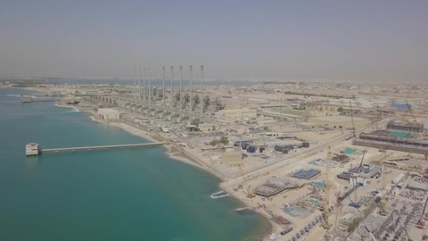 Saudi desalination plants and vessel with large crane (4K)