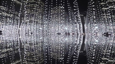 London, United Kingdom (UK) - 01 25 2019: Trippy immersive light installation mirror effect at night, perfect for music videos, 4k London